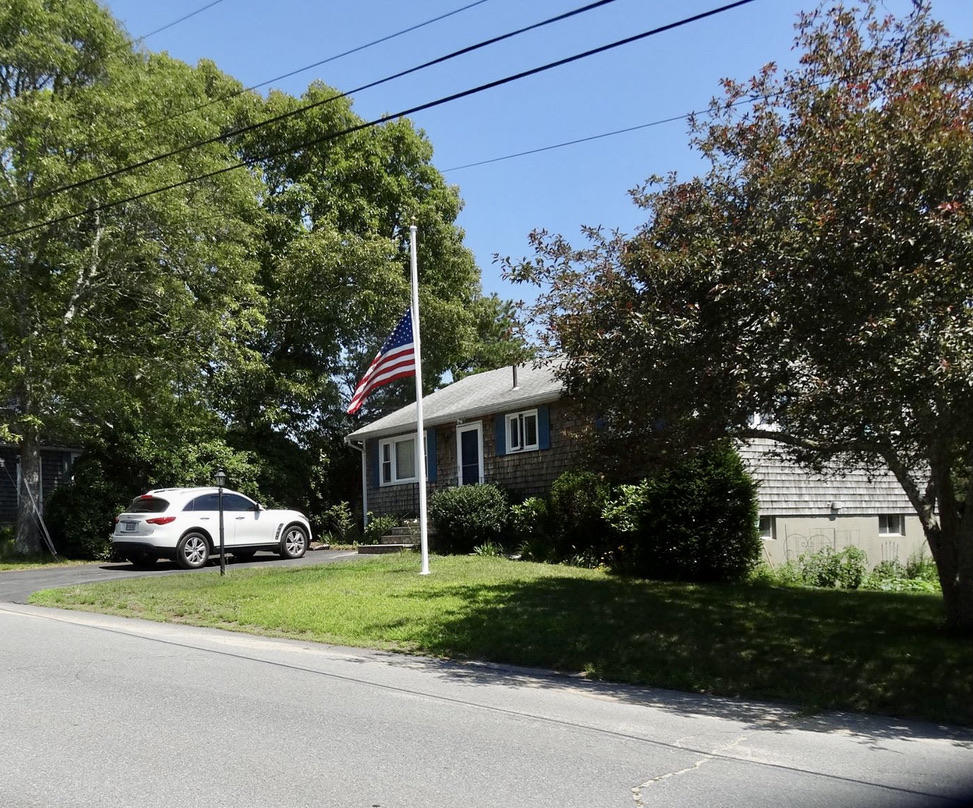 3 Wenonah Road Buzzards Bay, MA 02532 - Photo 1 of 25 a car parked in front of house with a yard