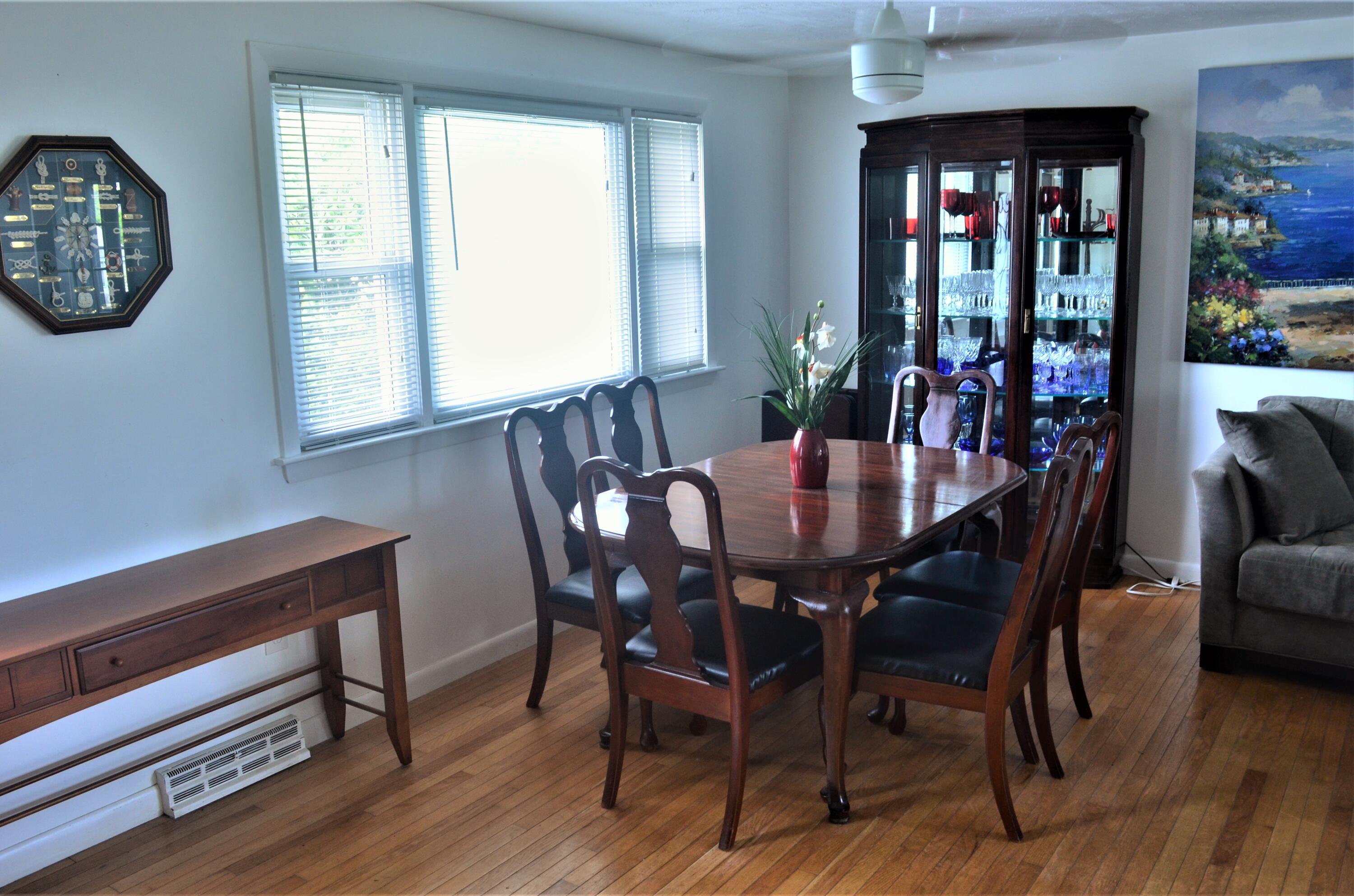 3 Wenonah Road Buzzards Bay, MA 02532 - Photo 12 of 25 a view of a dining room with furniture window and wooden floor