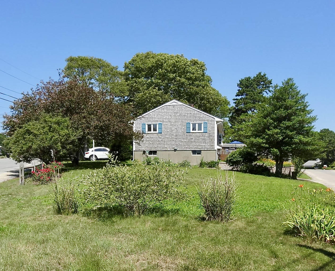 3 Wenonah Road Buzzards Bay, MA 02532 - Photo 2 of 25 a house view with a garden space