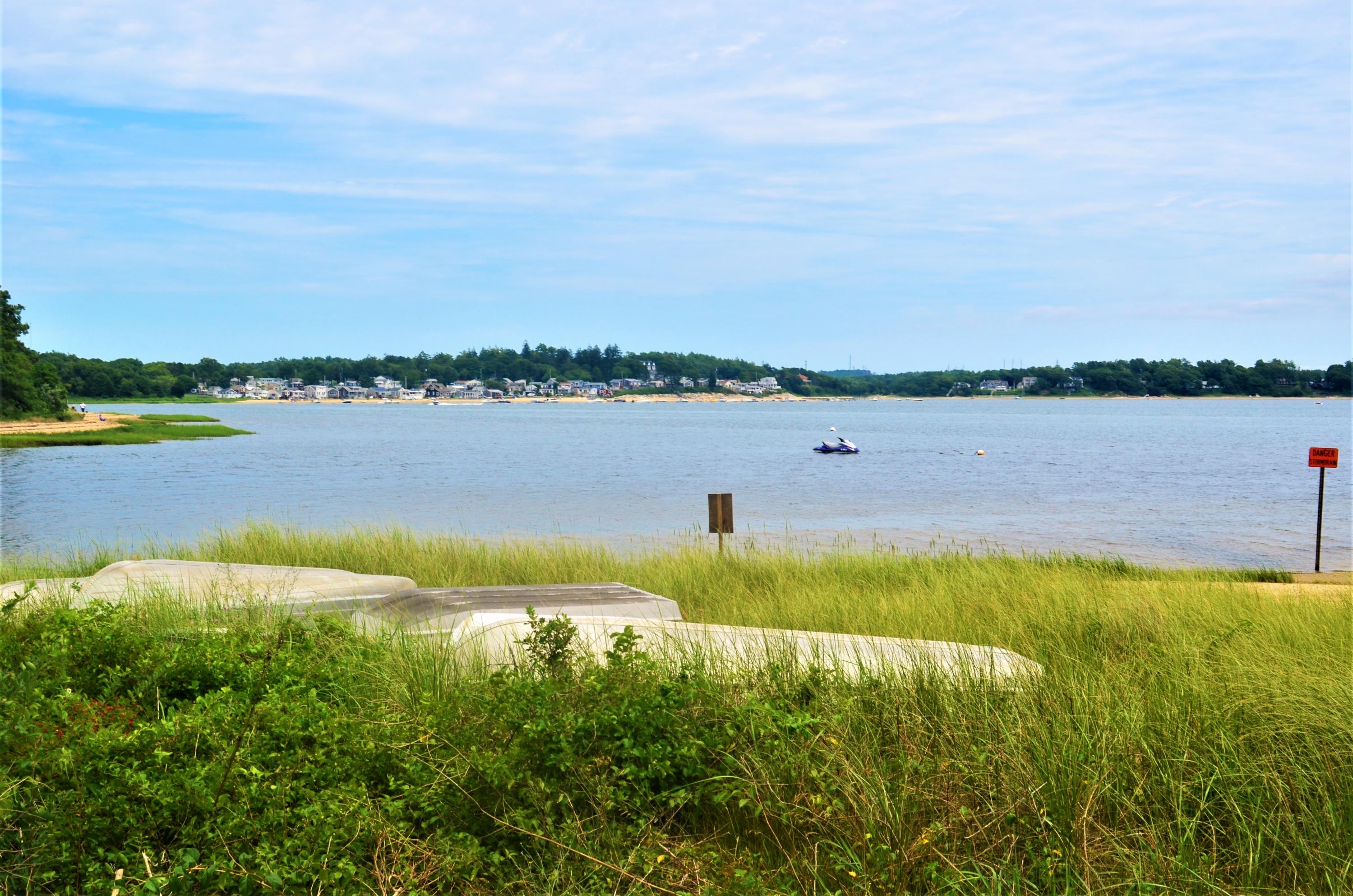 3 Wenonah Road Buzzards Bay, MA 02532 - Photo 7 of 25 a view of a lake with a city