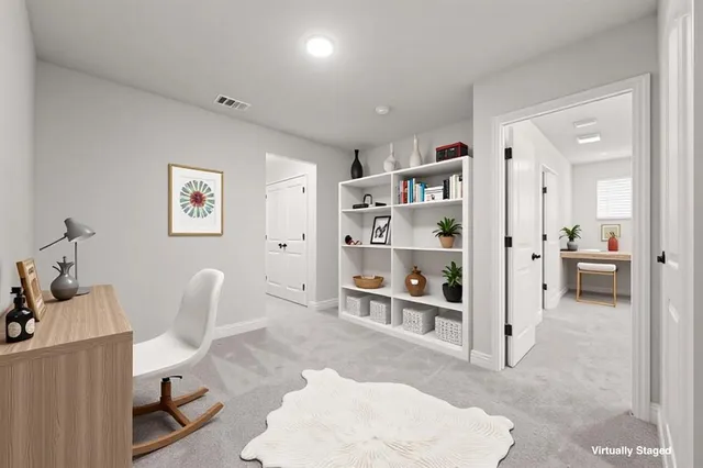 a bathroom with a sink toilet and a mirror