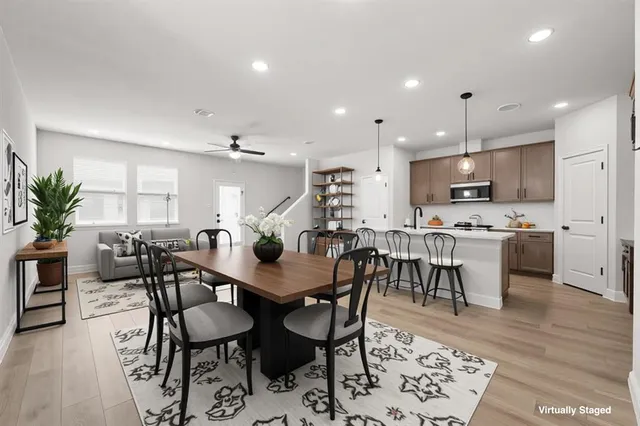 a view of a dining room with furniture