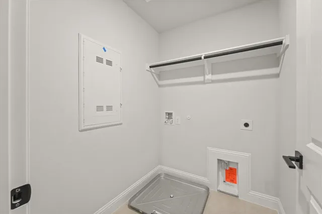 a bathroom with a shower and toilet