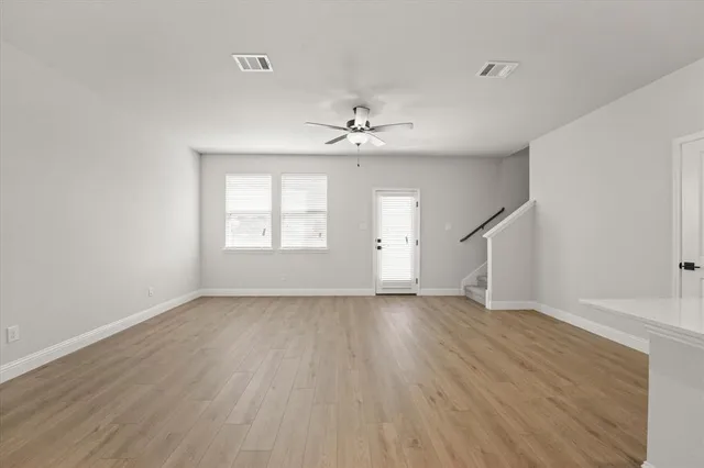 a view of kitchen with wooden floor