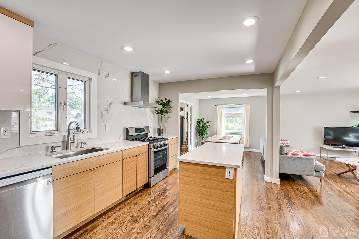 5 Leland Road Edison, NJ 08817 - Photo 13 of 48 a large kitchen with stainless steel appliances lots of counter top space
