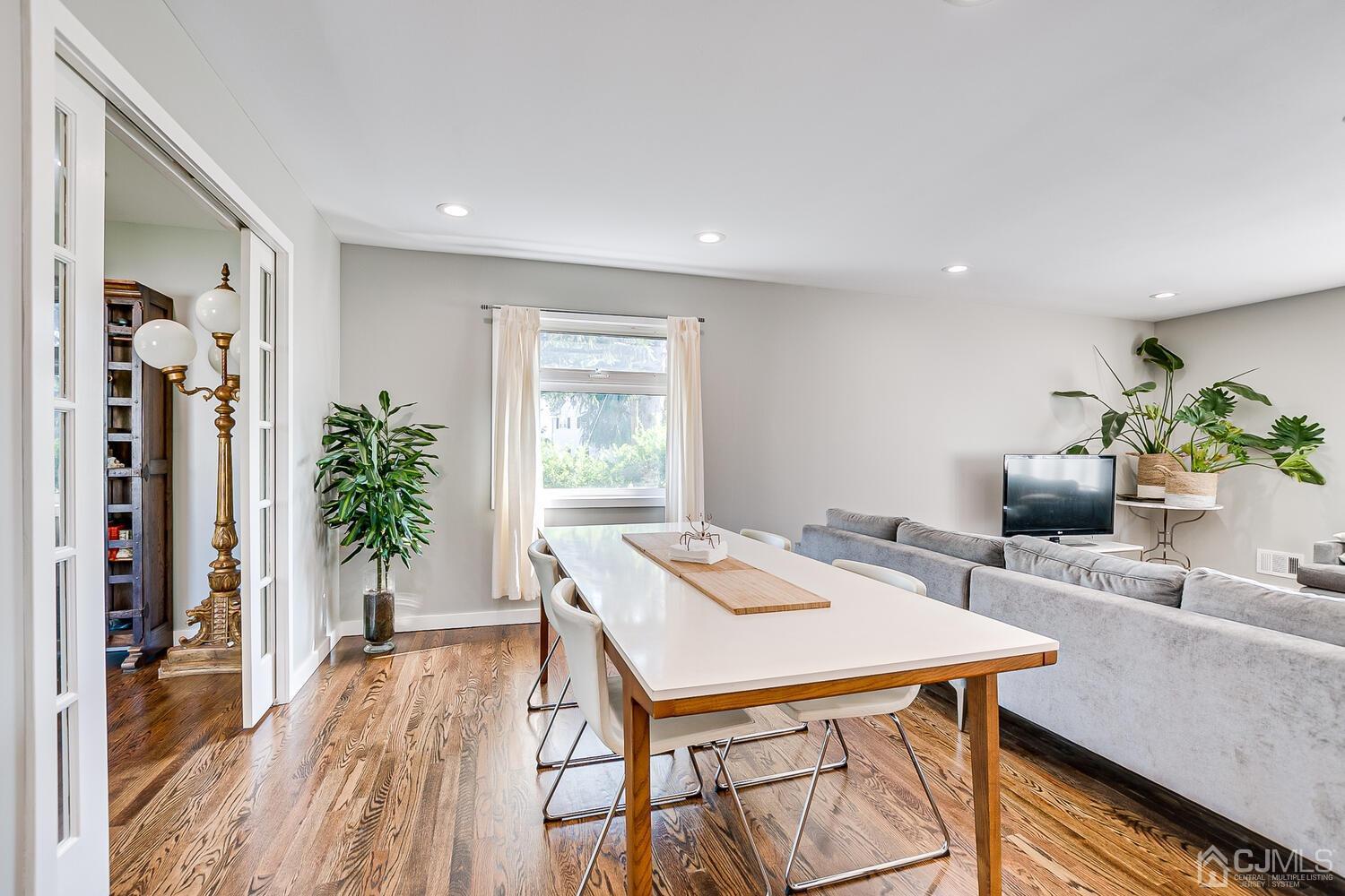 5 Leland Road Edison, NJ 08817 - Photo 20 of 48 a view of a dining room with furniture window and wooden floor