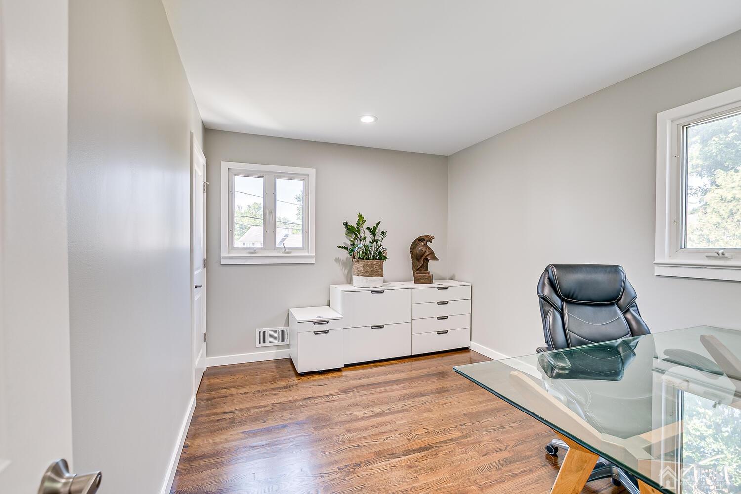 5 Leland Road Edison, NJ 08817 - Photo 27 of 48 a living room with furniture and a wooden floor
