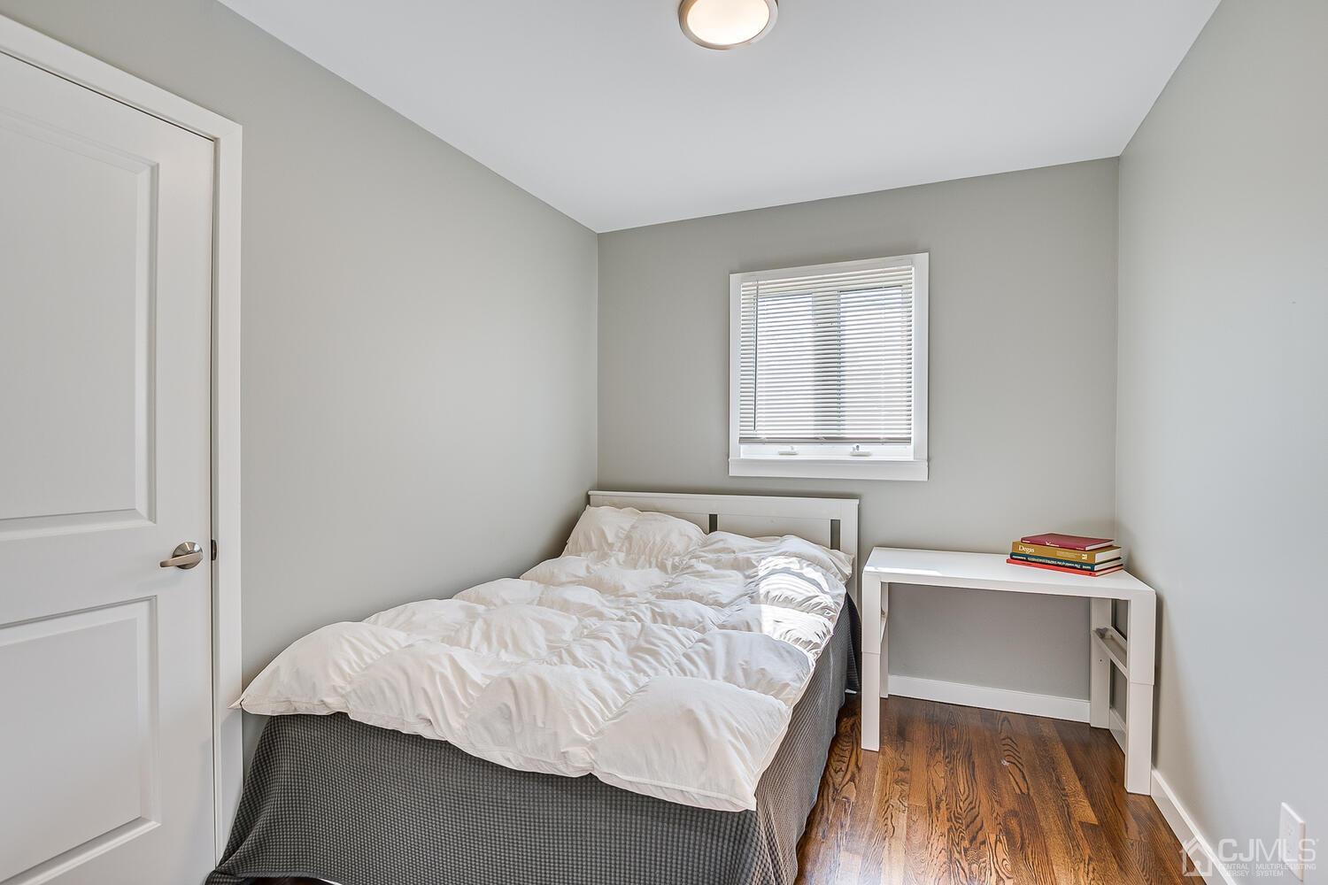 5 Leland Road Edison, NJ 08817 - Photo 29 of 48 a bedroom with a bed and a window