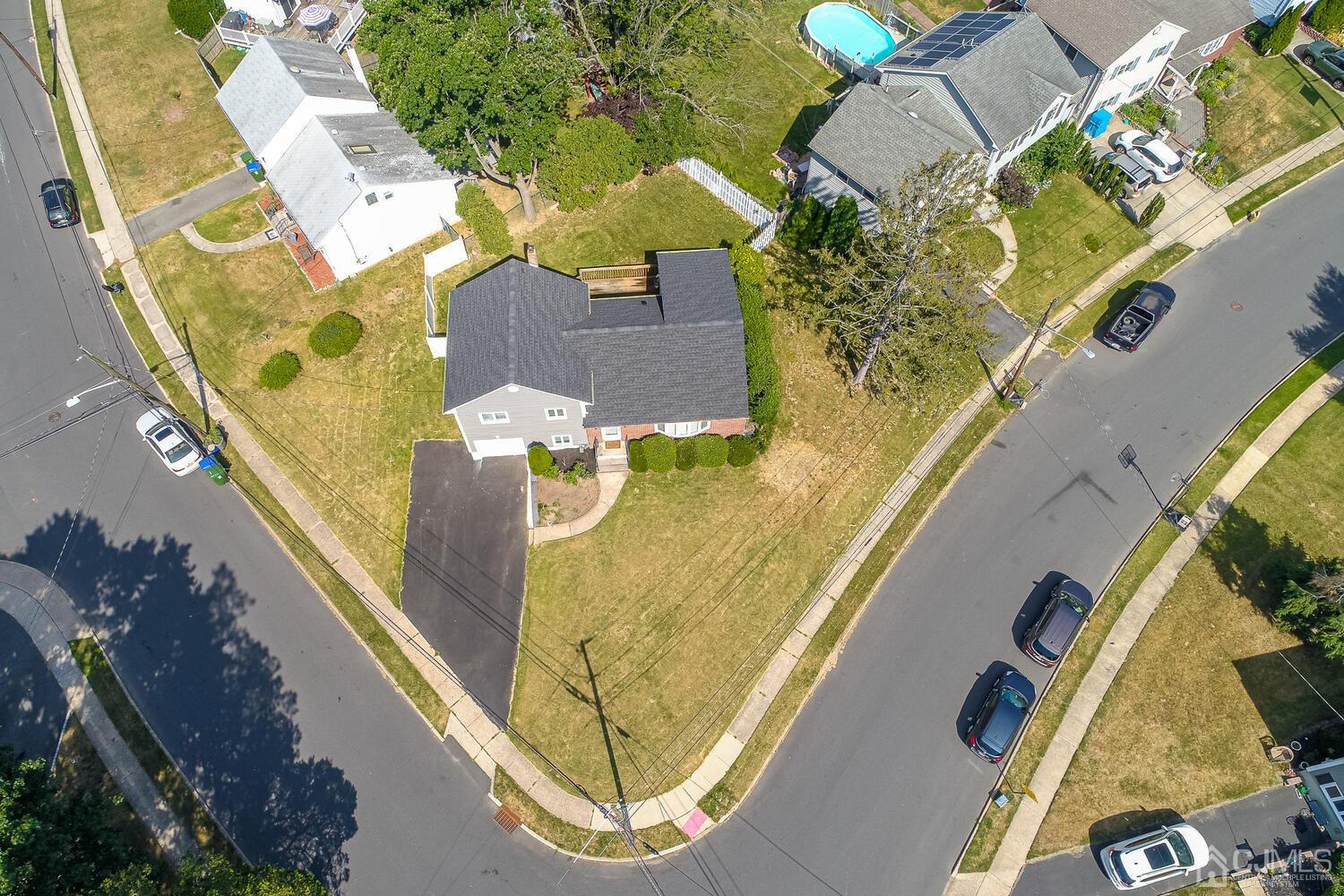 5 Leland Road Edison, NJ 08817 - Photo 3 of 48 an aerial view of a swimming pool