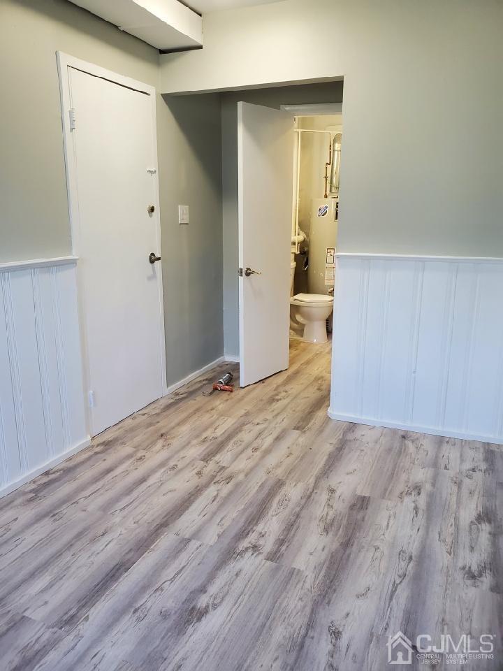 5 Leland Road Edison, NJ 08817 - Photo 32 of 48 a view of a big room with wooden floor and closet