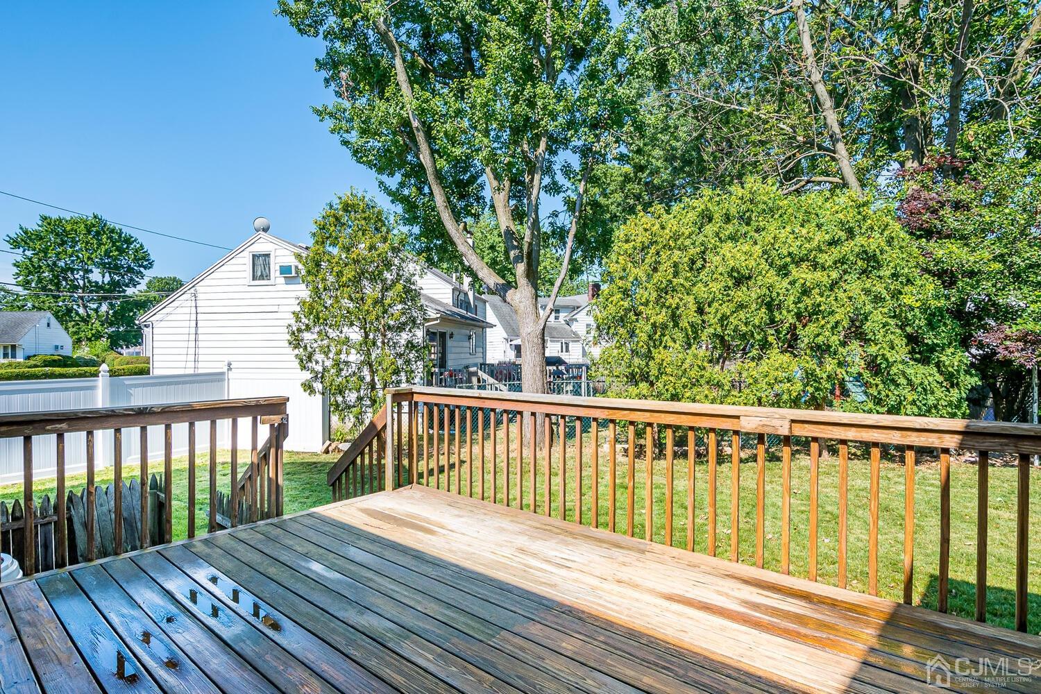 5 Leland Road Edison, NJ 08817 - Photo 38 of 48 a view of balcony with wooden floor and fence