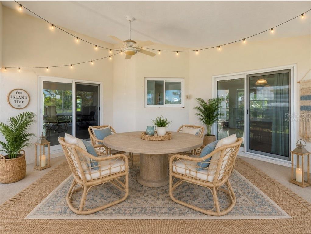 192 Azalea Road Edgewater, FL 32141 - Photo 67 of 94 a dining room with furniture and window
