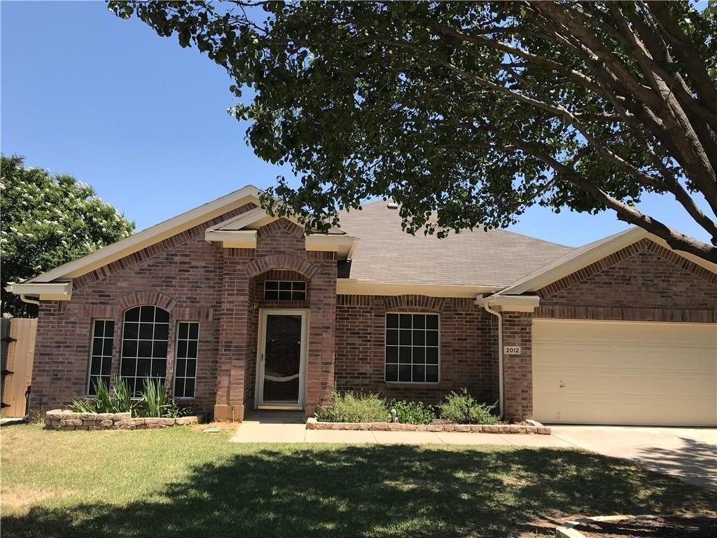 2012 Piper Drive Corinth, TX 76210 - Photo 2 of 27 front view of a house with a yard