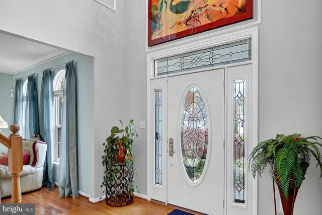 view of entryway with wooden floor