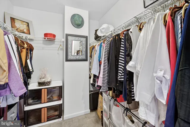 a large spacious bathroom with a tub and shower
