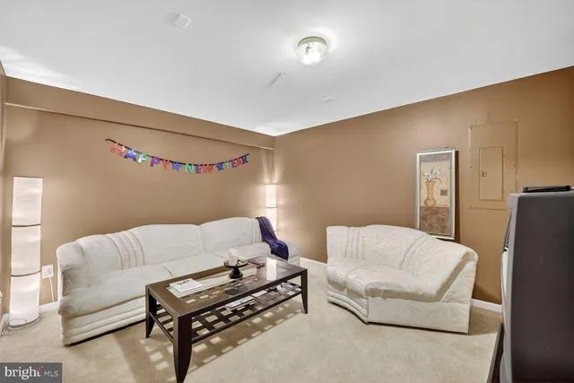 a view of a livingroom with furniture and a couch