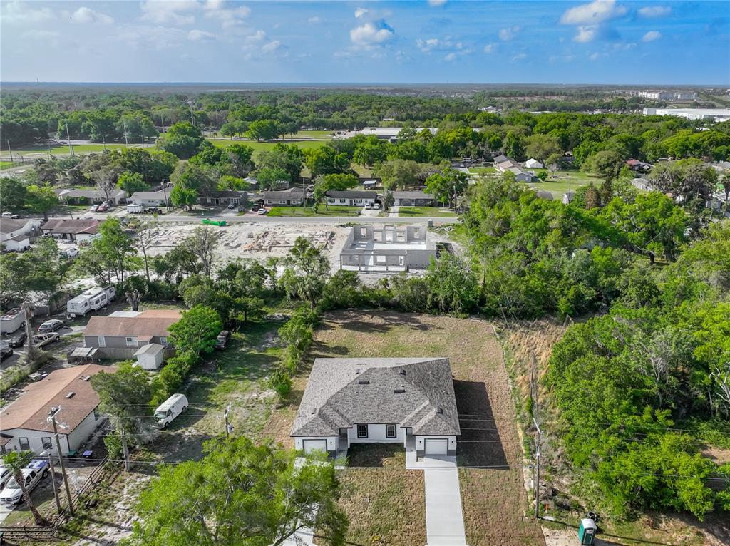 356 West 4th Street Apopka, FL 32703 - Photo 2 of 32 an aerial view of a house with a yard