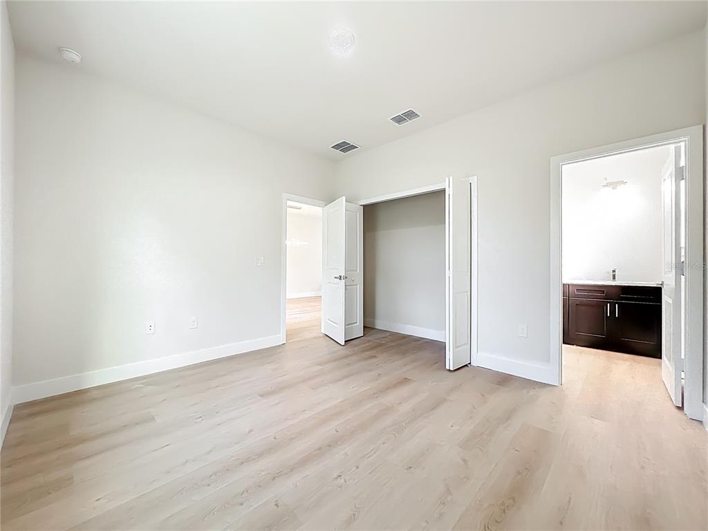 356 West 4th Street Apopka, FL 32703 - Photo 27 of 32 a view of a livingroom with wooden floor