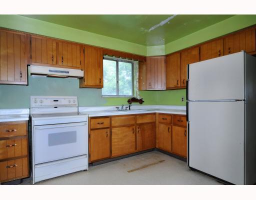 656 Anderson Hozak Road Clinton, PA 15026 - Photo 6 of 11 Kitchen. 10x10 eat in kitchen, solid wood cabinets, electric stove & refrigerator included.