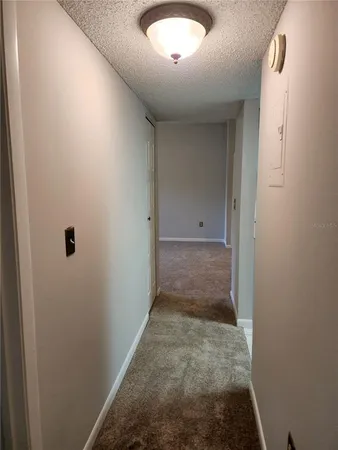 wooden floor and window in an empty room