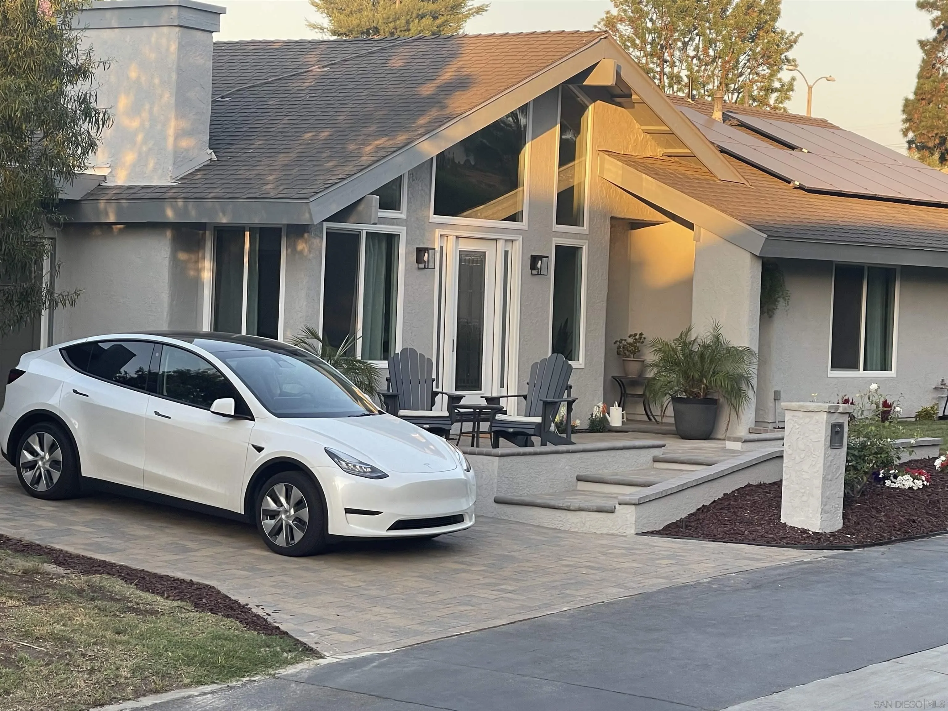 22863 Ridge Rte Lane Lake Forest, CA 92630 - Photo 2 of 5 a car parked in front of white house