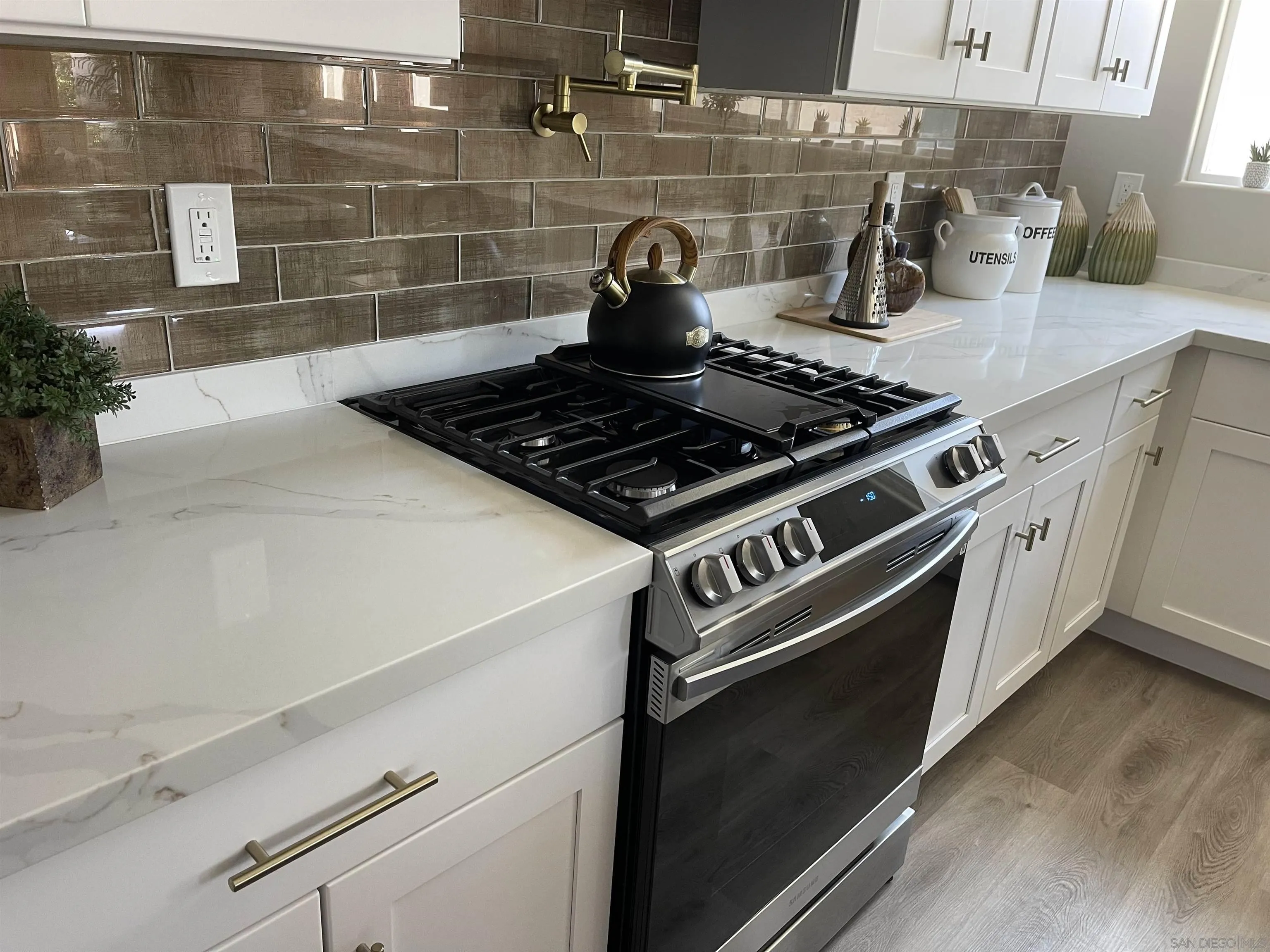 22863 Ridge Rte Lane Lake Forest, CA 92630 - Photo 5 of 5 closeup of a stove top oven sitting inside of a kitchen