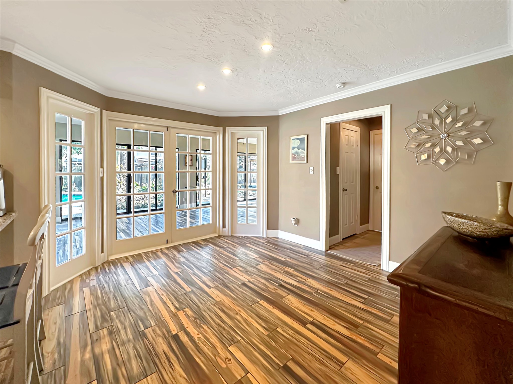17418 Spicewood Springs Lane Spring, TX 77379 - Photo 7 of 50 a view of empty room with wooden floor and fan