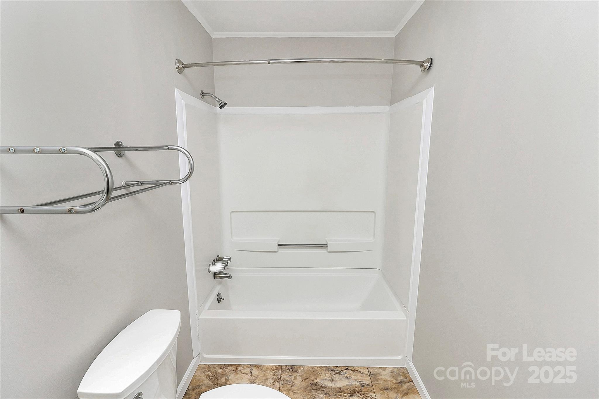 8911 Reames Road Charlotte, NC 28216 - Photo 24 of 31 a bathroom with a shower a toilet and a shower