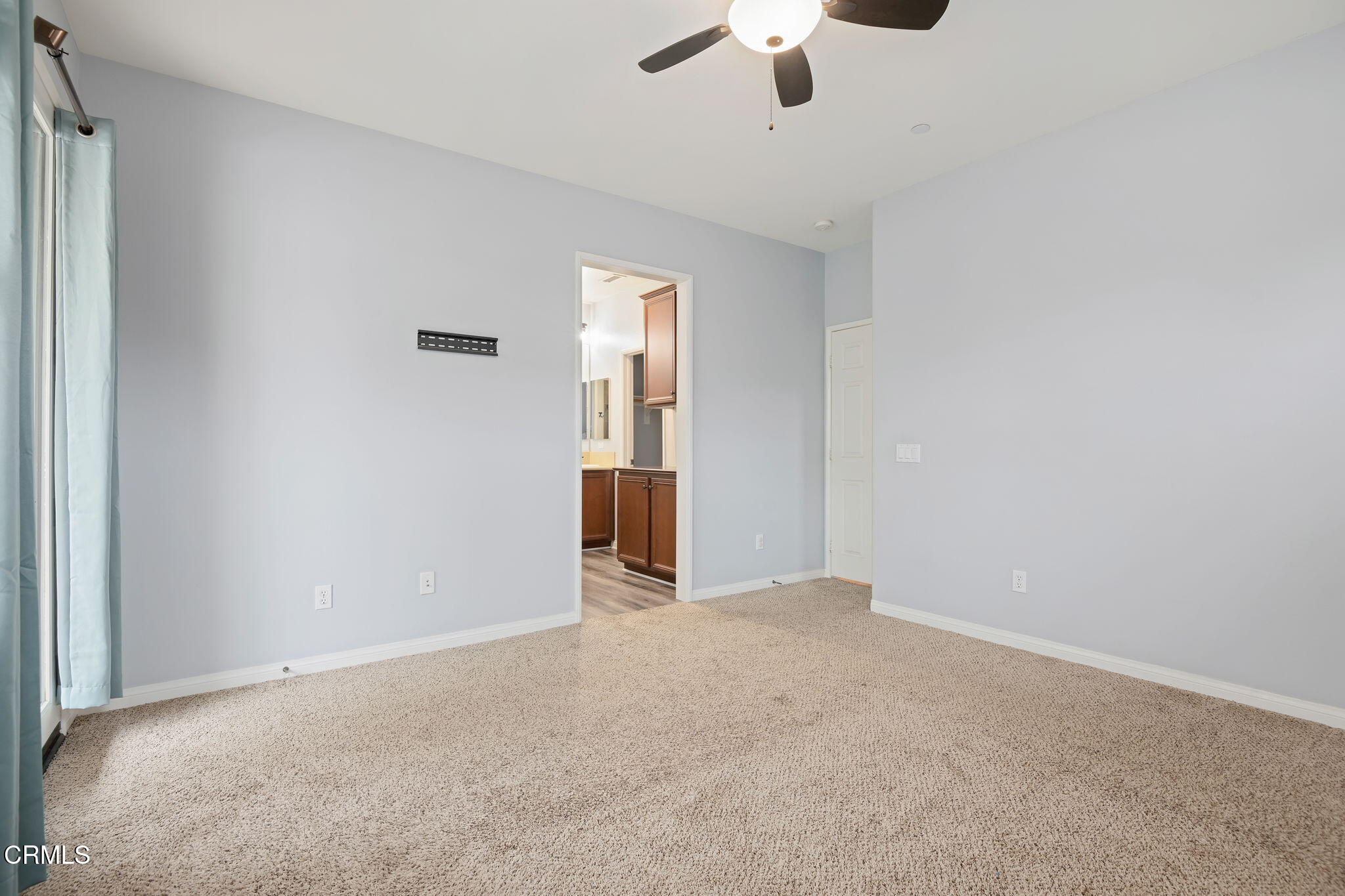 3233 Moss Landing Boulevard Oxnard, CA 93036 - Photo 13 of 25 an empty room with fan and windows