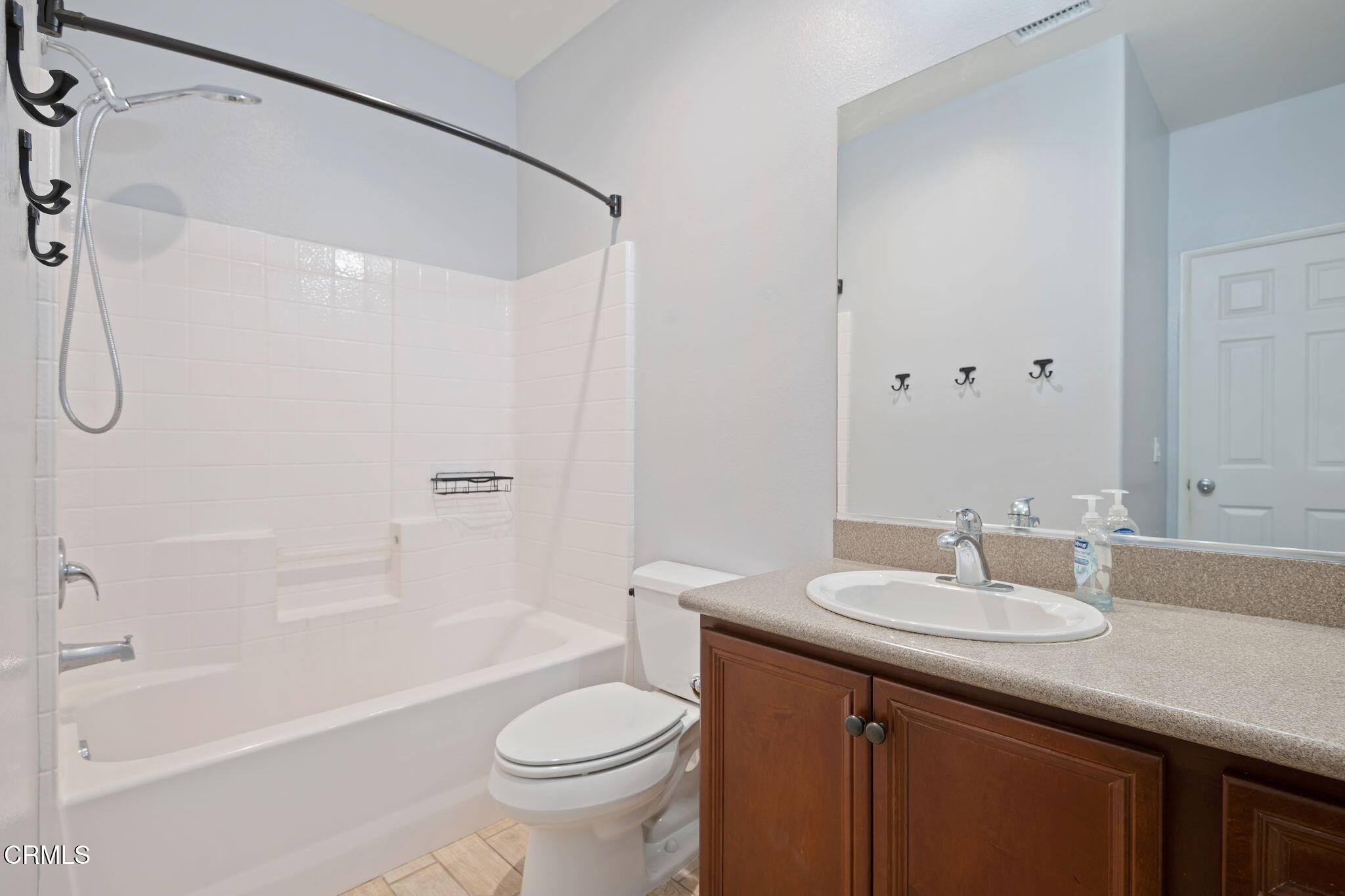 3233 Moss Landing Boulevard Oxnard, CA 93036 - Photo 16 of 25 a bathroom with a sink a toilet and shower