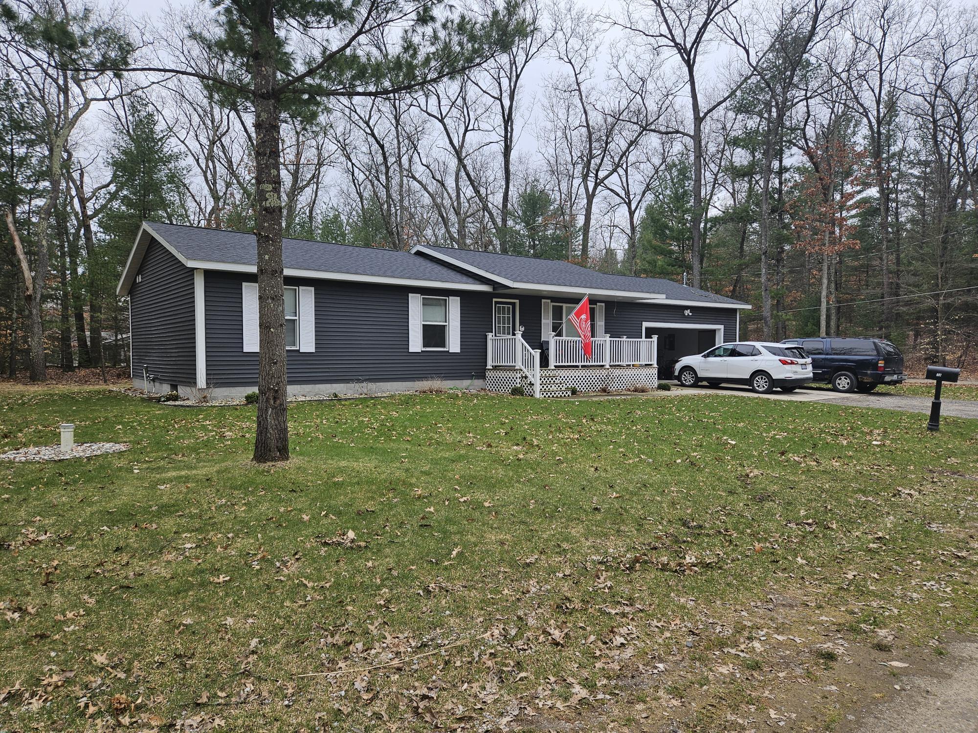687 Cherry Road Twin Lake, MI 49457 - Photo 1 of 14 20250410_125416