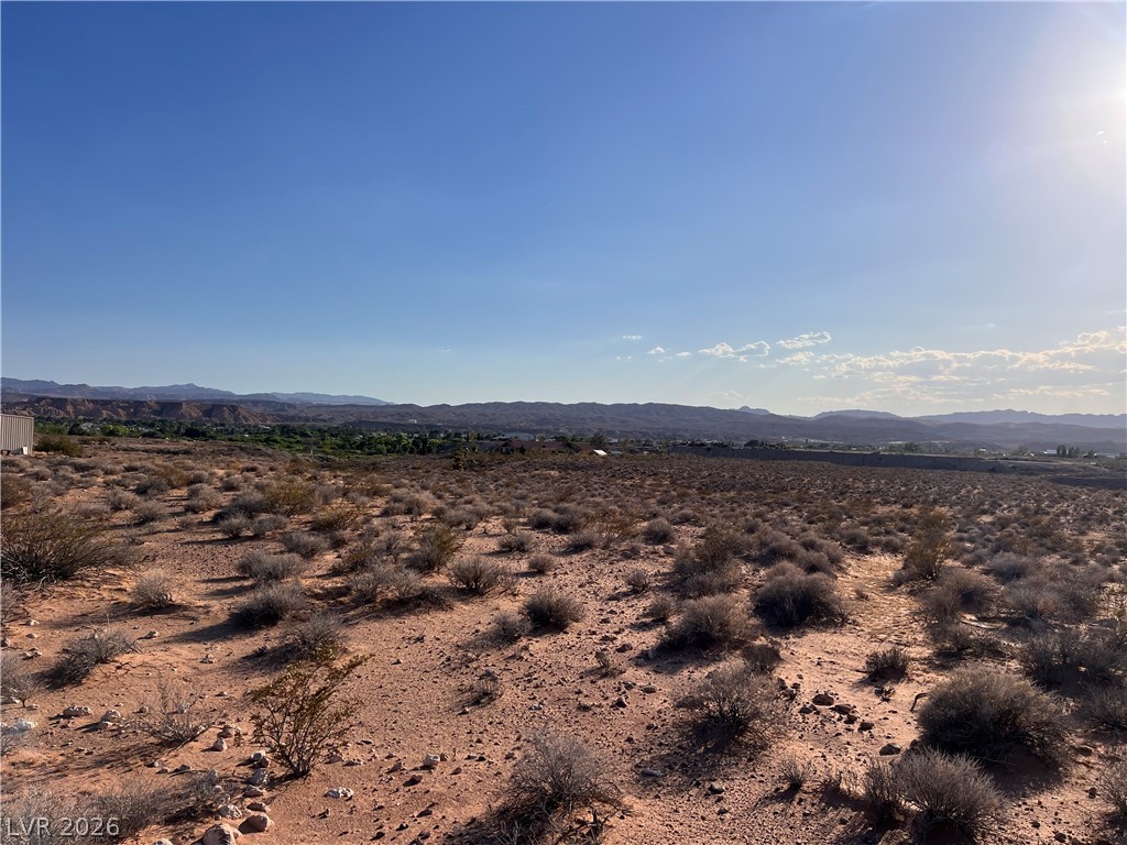 North Ishimoto Overton, NV 89040 - Photo 5 of 10 This undeveloped land offers a wide-open panorama of distant mountains and clear skies.