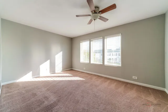 a bathroom with a sink a large mirror and a bathtub with shower