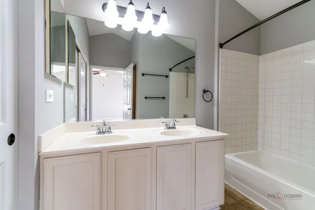 a view of a house with backyard and garden