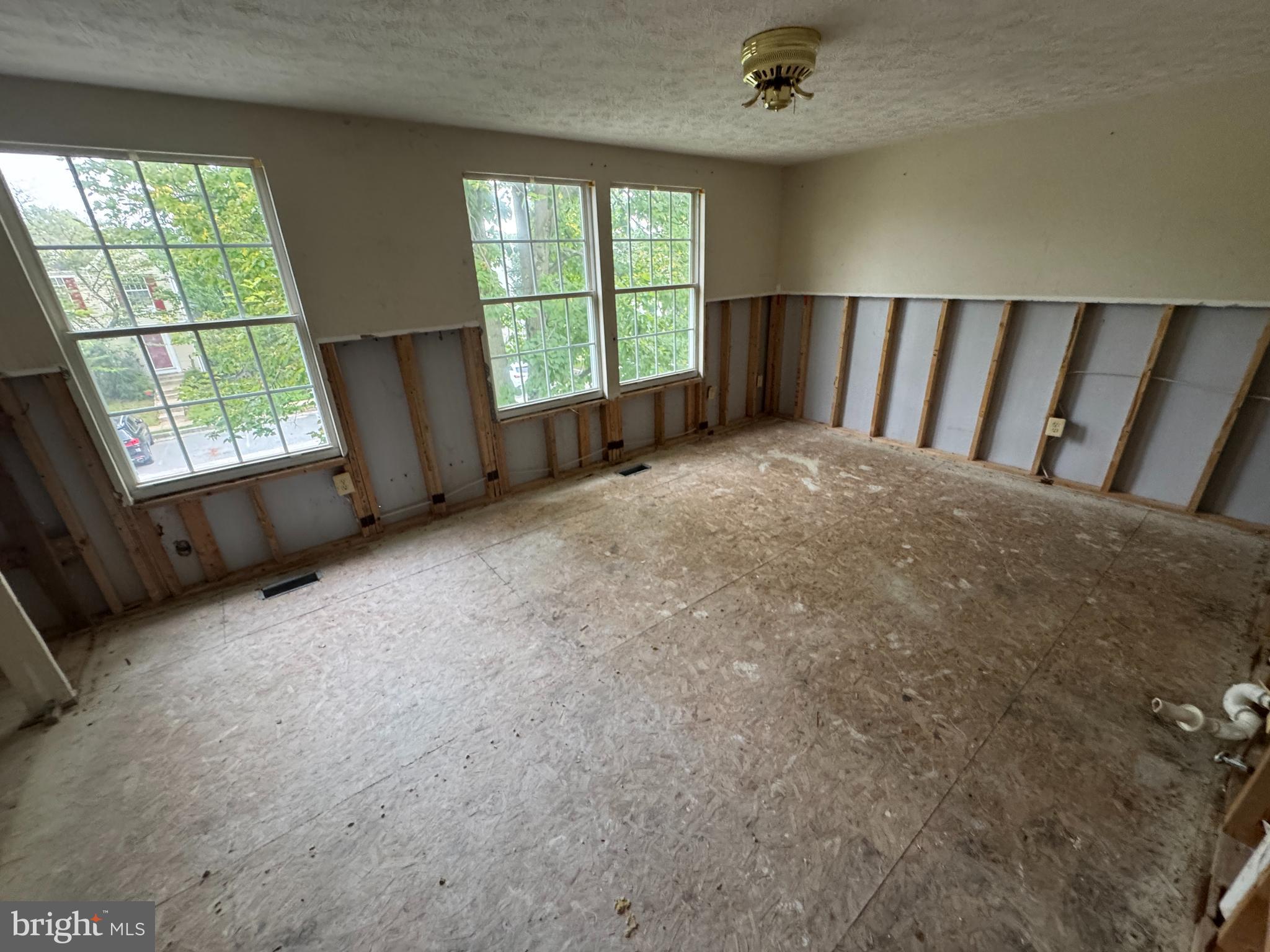 2254 Riding Crop Way Windsor Mill, MD 21244 - Photo 5 of 10 an empty room with windows