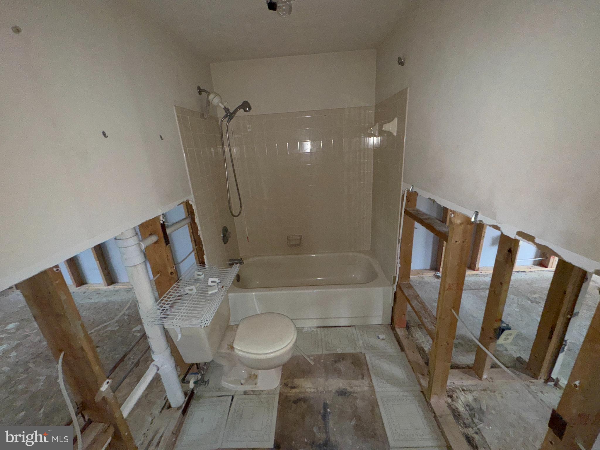 2254 Riding Crop Way Windsor Mill, MD 21244 - Photo 7 of 10 a bathroom with a sink toilet and shower