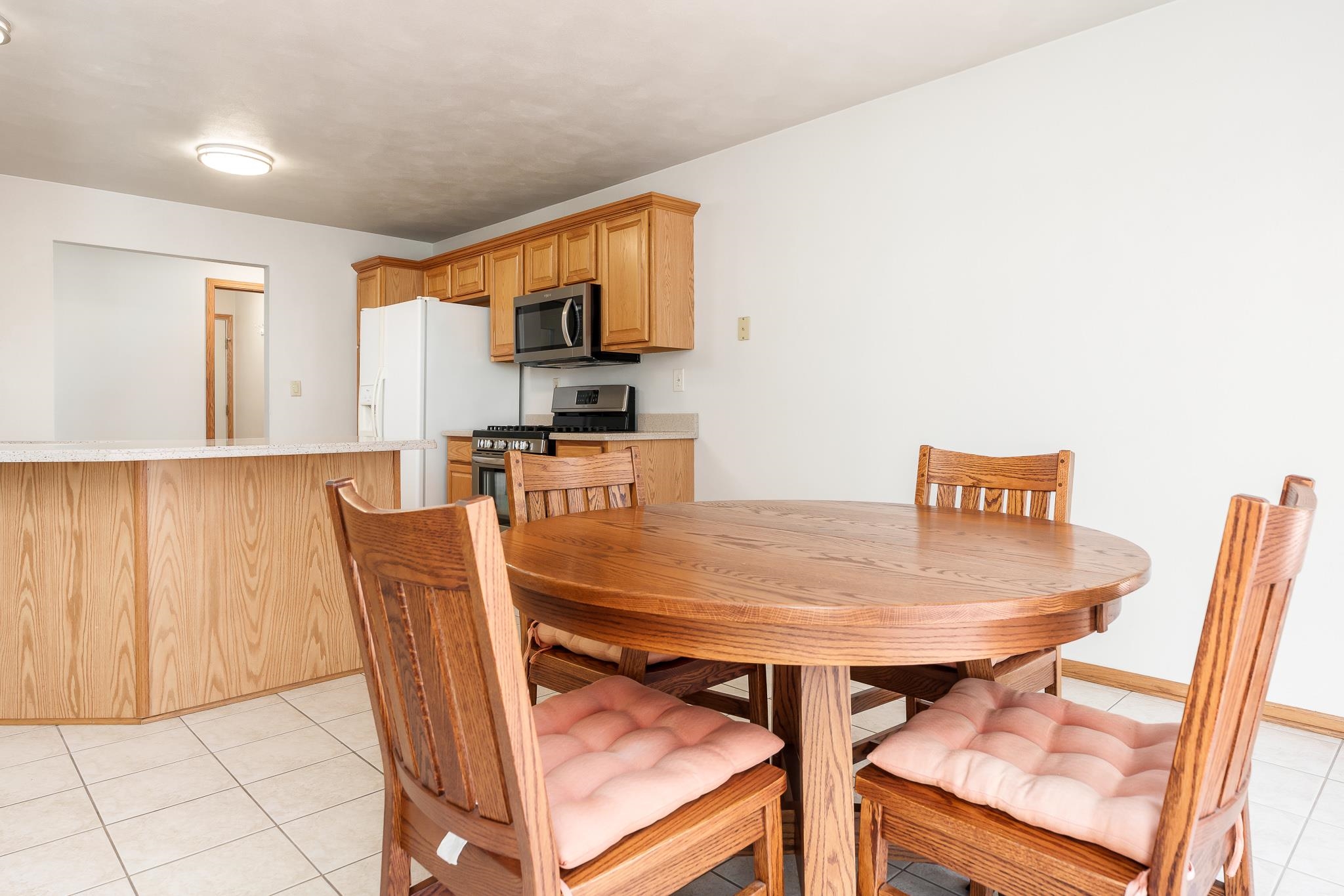 10703 Chicory Ridge Way Roscoe, IL 61073 - Photo 44 of 64 a dining room with furniture and window