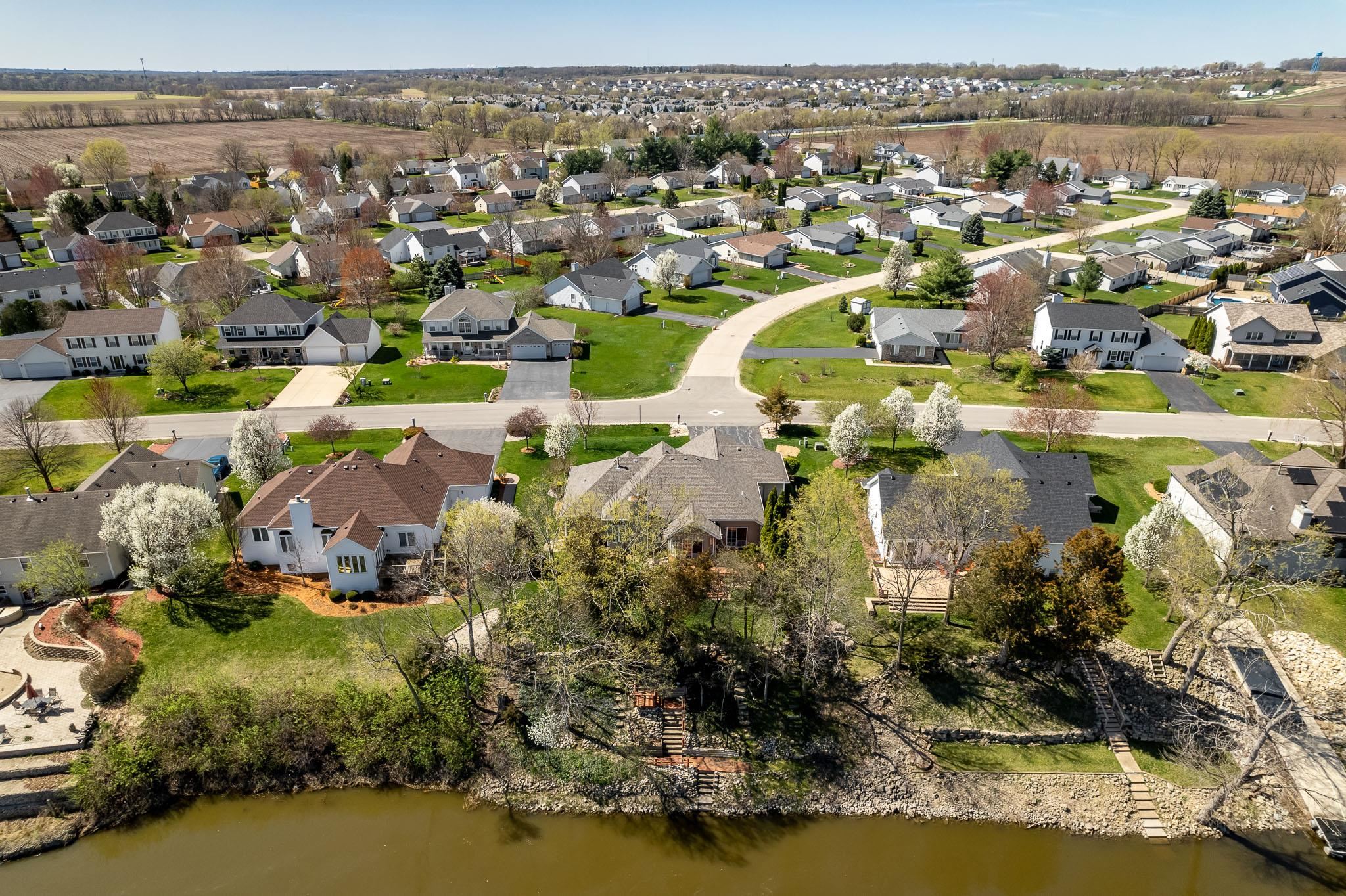 10703 Chicory Ridge Way Roscoe, IL 61073 - Photo 9 of 64 an aerial view of residential houses with outdoor space