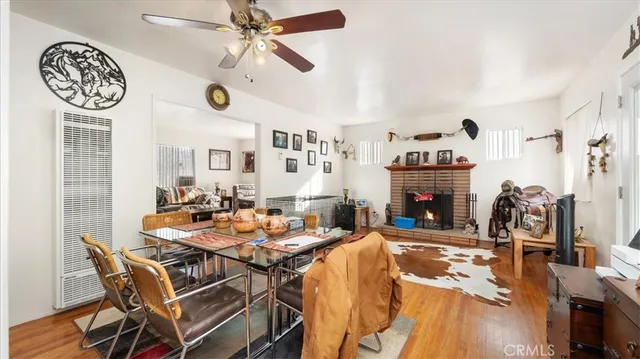 a kitchen with a stove and white cabinets