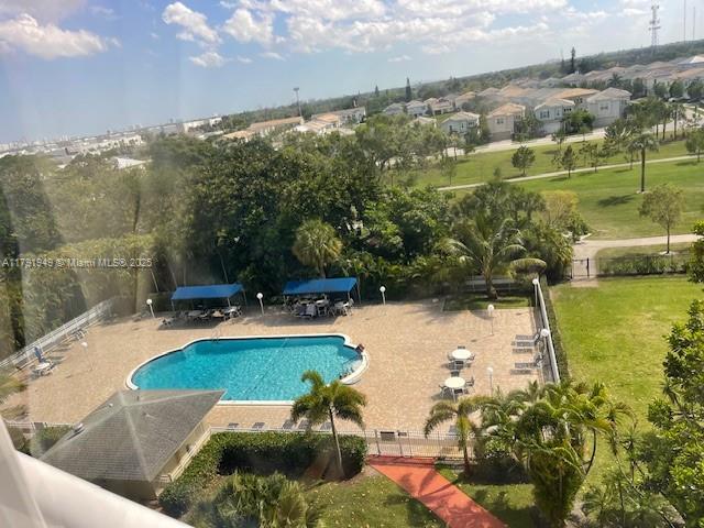 4400 Hillcrest Drive, Unit 701B Hollywood, FL 33021 - Photo 19 of 20 a view of a swimming pool with a yard
