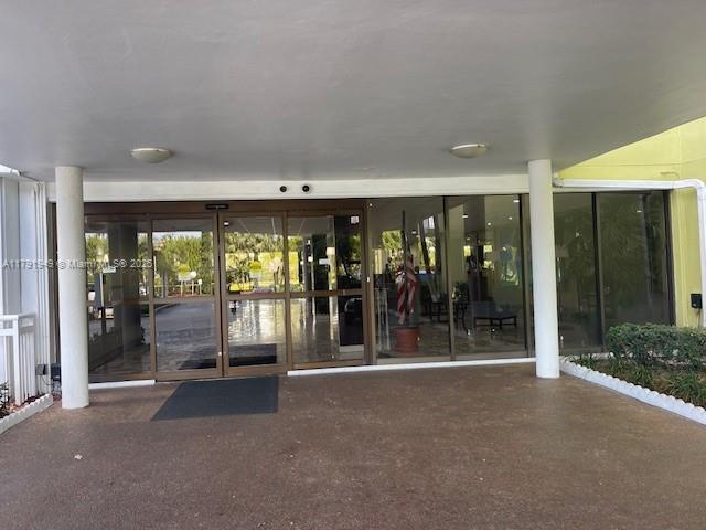 4400 Hillcrest Drive, Unit 701B Hollywood, FL 33021 - Photo 3 of 20 a view of a building with floor to ceiling window and outdoor