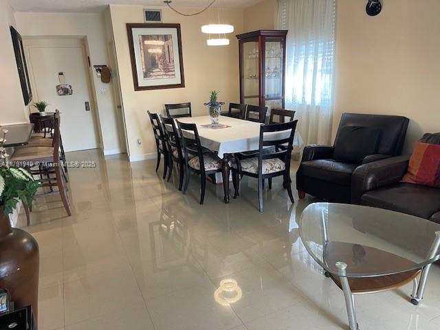 4400 Hillcrest Drive, Unit 701B Hollywood, FL 33021 - Photo 8 of 20 a view of a dining room with furniture