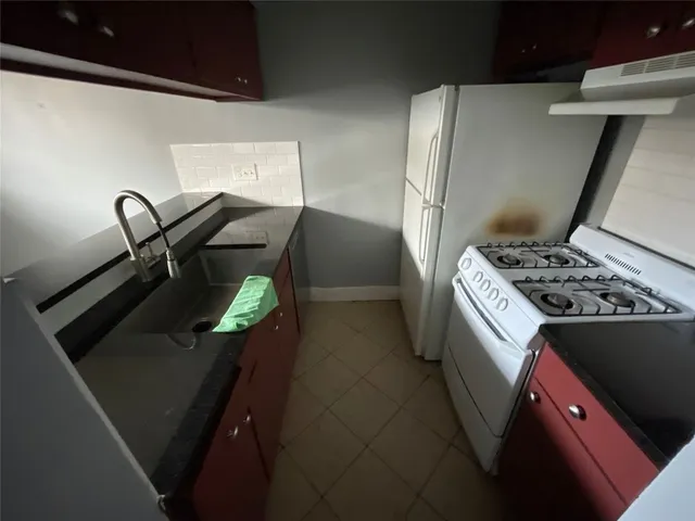 a bathroom with a toilet and a sink