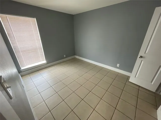 a view of a house with a large window