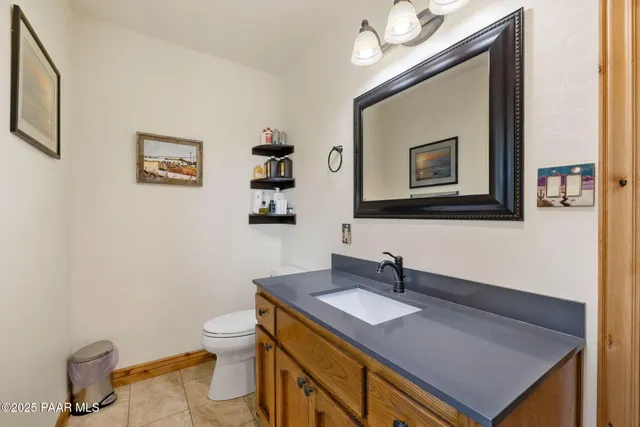 a bedroom with a bed and a bookshelf