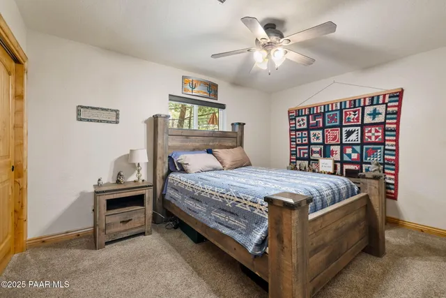 a bath room with a toilet a sink and a bath tub