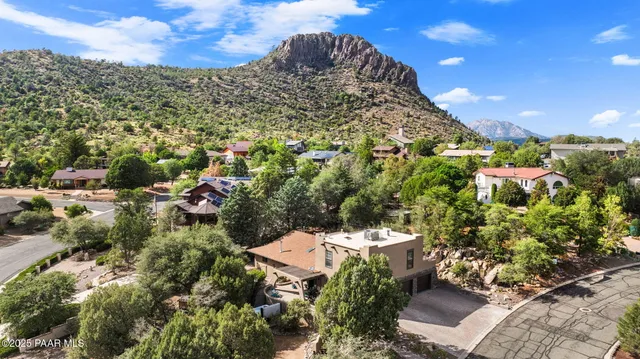 a view of a garden with a building