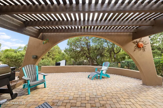 a view of outdoor space with deck and furniture