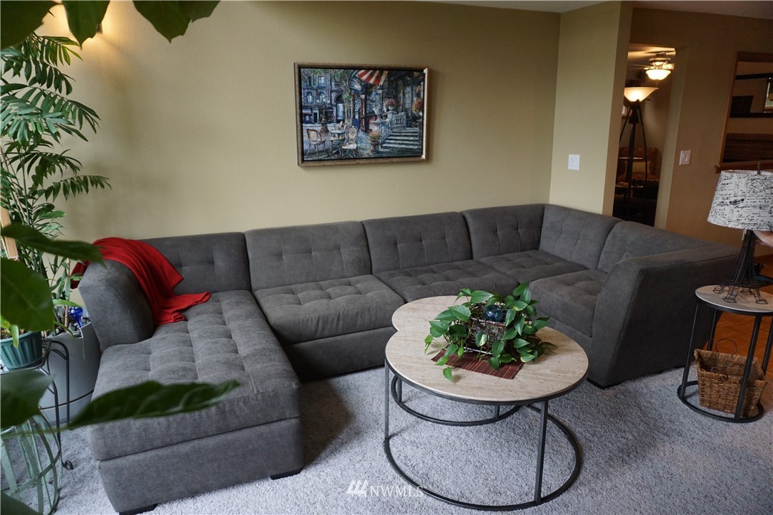 17813 Butler Road Snohomish, WA 98290 - Photo 7 of 23 a living room with furniture and a potted plant