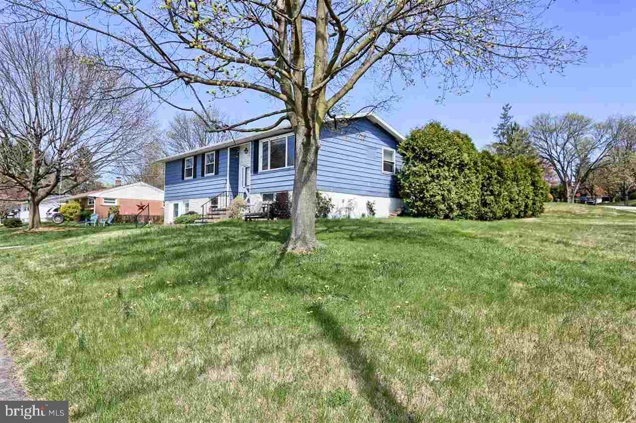 1409 Wogan Road York, PA 17404 - Photo 2 of 36 a view of a house with a yard